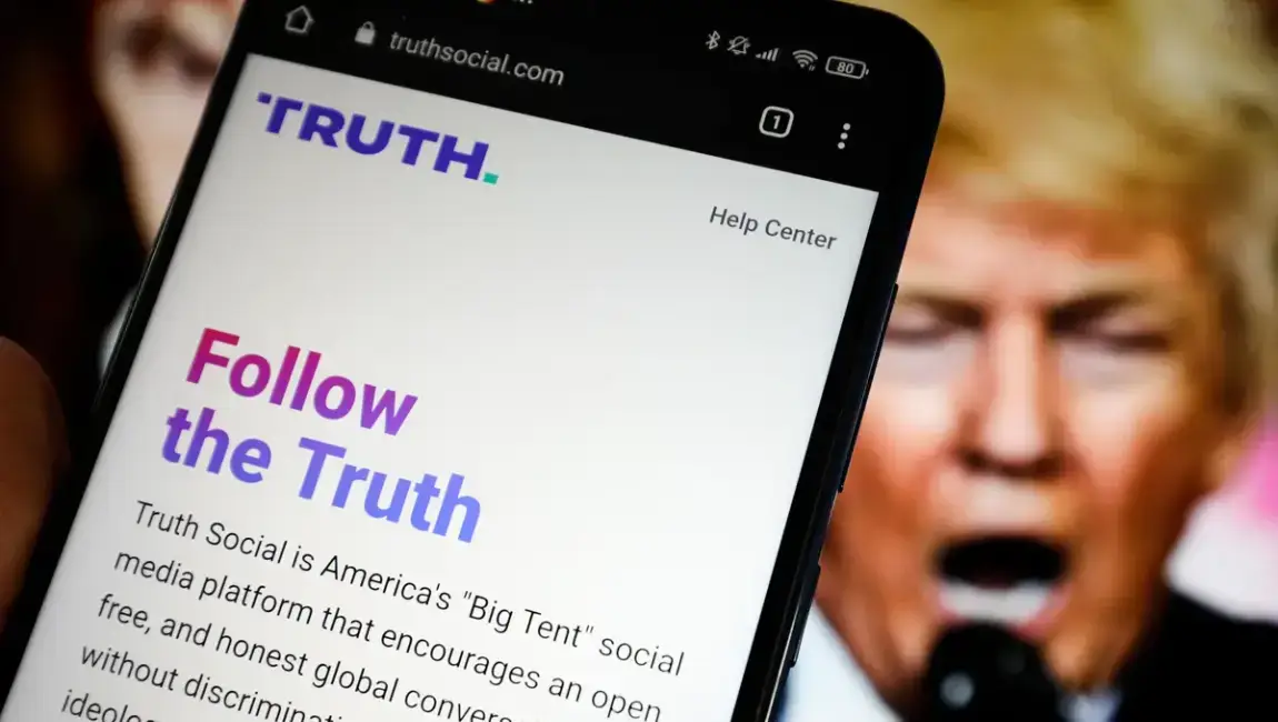 Donald Trump and a phone with Truth Social app