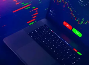 Computer with candlestick chart