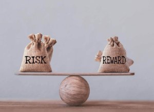 balancing scale of risk and reward
